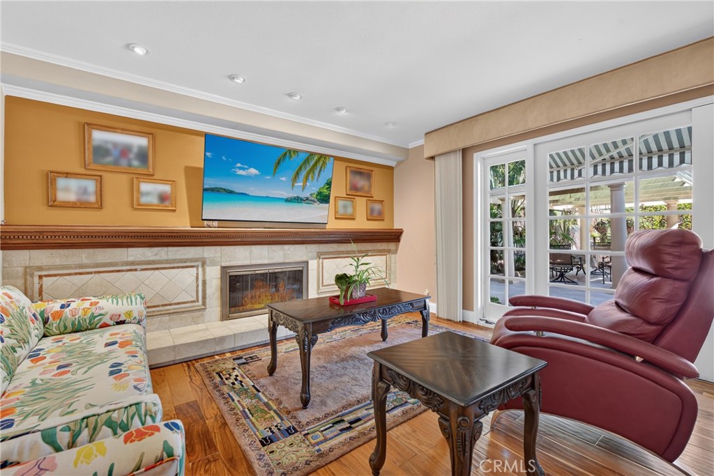 Welcoming family room with fireplace - 2740 Cardinal Drive, Costa Mesa CA 92626 - photo 31