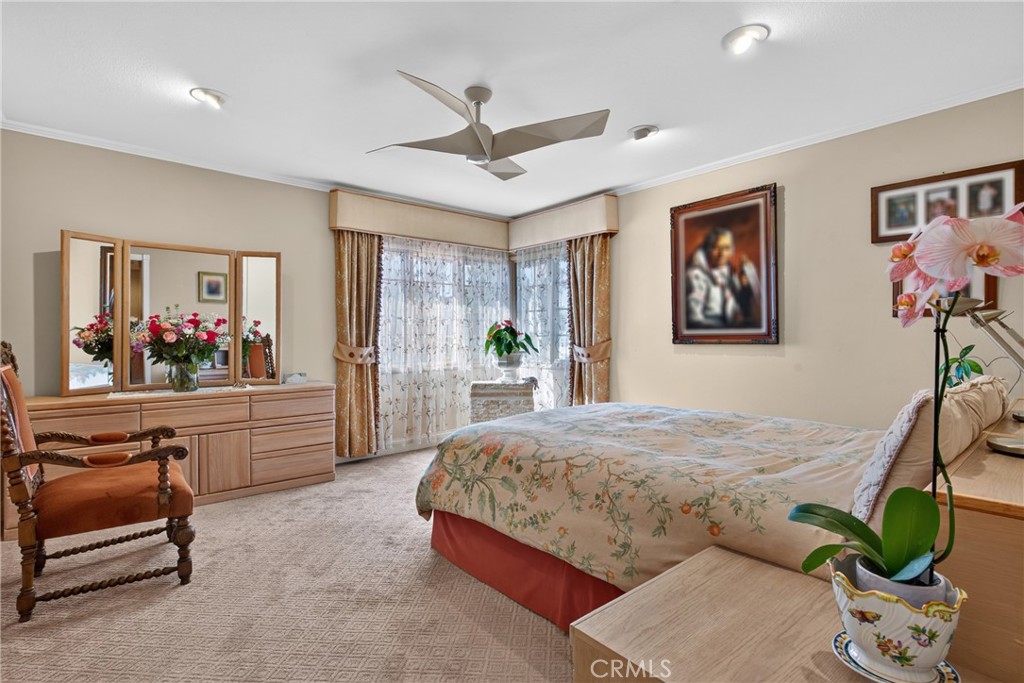 Master suite has walk in closet, spa tub and separate mosaic tiled shower with massage water features. - 2740 Cardinal Drive, Costa Mesa CA 92626 - photo 32