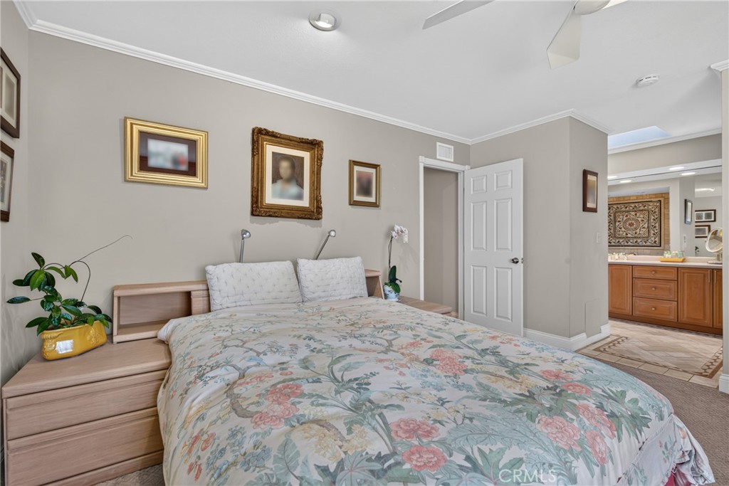 Master suite has walk in closet, spa tub and separate mosaic tiled shower with massage water features. - 2740 Cardinal Drive, Costa Mesa CA 92626 - photo 33