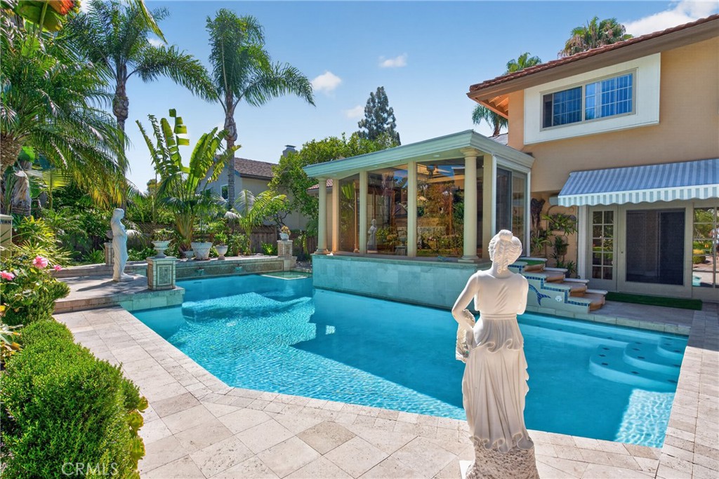 Oversized pool that resembles the Neptune Pool at San Simeon's Hearst Casltle, roomy spa and 3 decorative waterfalls in - 2740 Cardinal Drive, Costa Mesa CA 92626 - photo 53