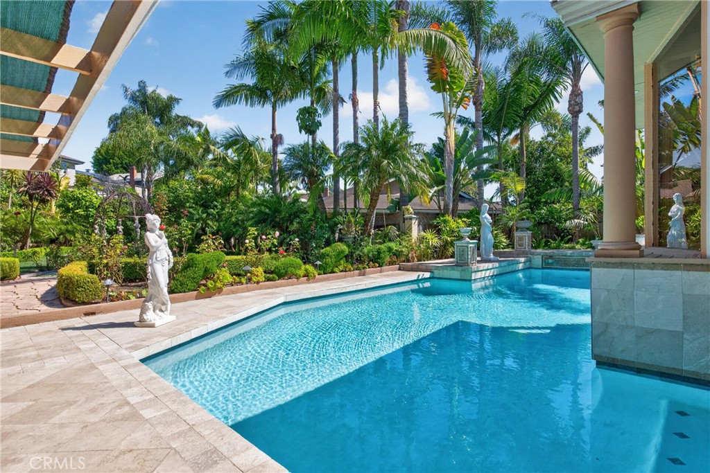 Oversized pool that resembles the Neptune Pool at San Simeon's Hearst Casltle, roomy spa and 3 decorative waterfalls in - 2740 Cardinal Drive, Costa Mesa CA 92626 - photo 59
