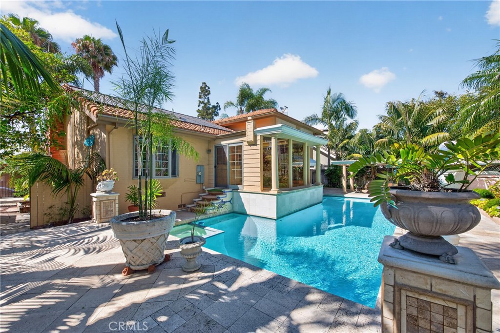 Oversized pool that resembles the Neptune Pool at San Simeon's Hearst Casltle, roomy spa and 3 decorative waterfalls in - 2740 Cardinal Drive, Costa Mesa CA 92626 - photo 61