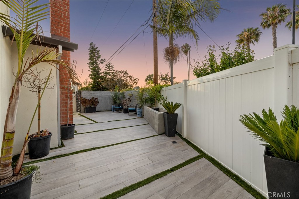 Secondary side yard is also private and could be a nice space if you create a bonus unit upstairs or an ADU in the garag - 2750 San Carlos, Costa Mesa CA 92626 - photo 27