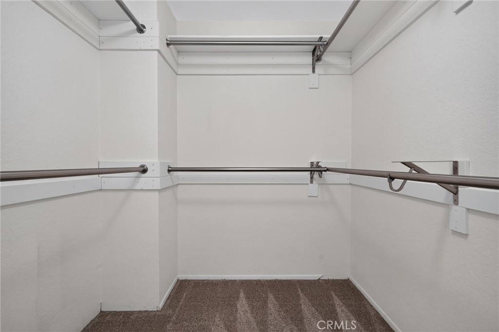 Primary Bedroom Walk-in Closet - 292 Palmer Street A1, Costa Mesa CA 92627 - photo 33