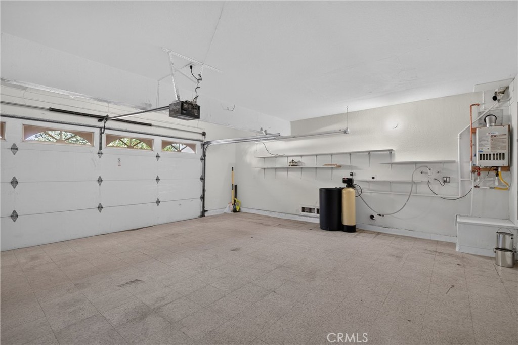 Attached garage with water softener system - 292 Palmer Street A1, Costa Mesa CA 92627 - photo 44