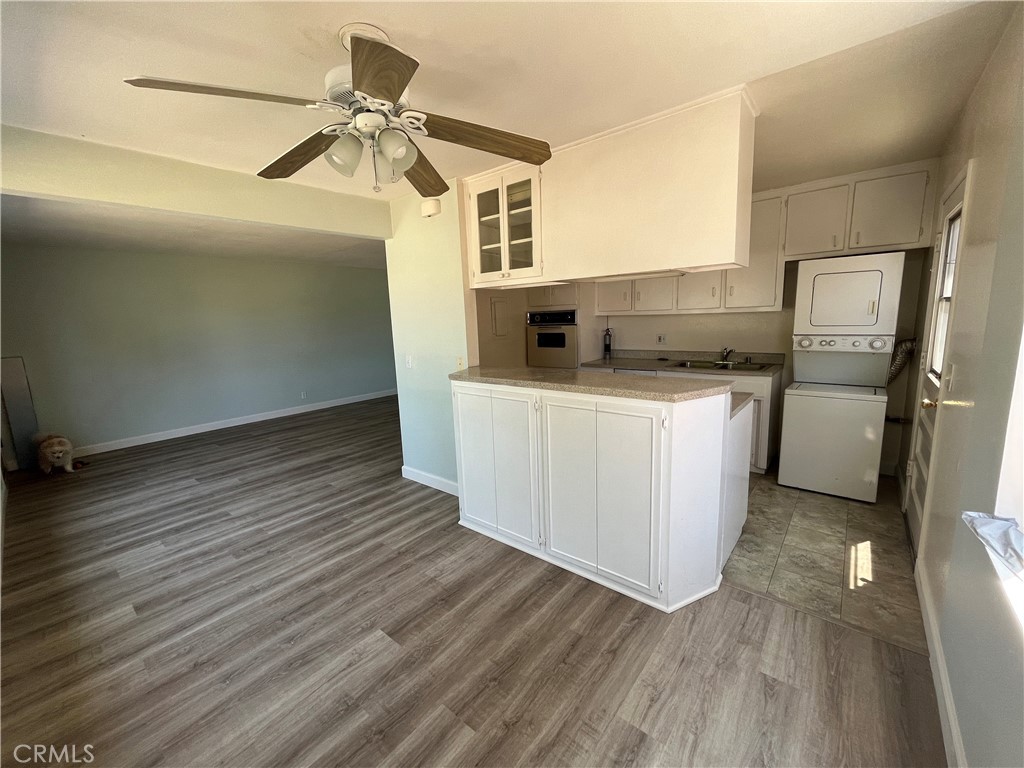 Dining room and kitchen - 2956 Peppertree, Costa Mesa CA 92626 - photo 4