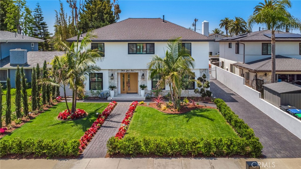 Fully reimagined 5-bedroom residence on a quiet Eastside Costa Mesa cul-de-sac | 305 Robinhood Ln., Eastside Costa Mesa - 305 Robinhood, Costa Mesa CA 92627 - photo 1