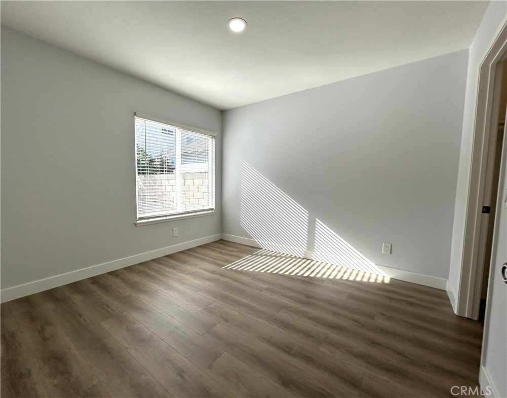 Convenient main-level bedroom - 3475 Fuchsia, Costa Mesa CA 92626 - photo 8