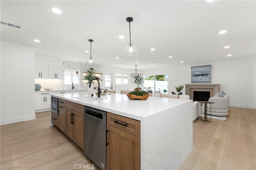 Original Photo - No AI edit of Fireplace - Massive Island with Sink - 394 Magnolia Street, Costa Mesa CA 92627 - photo 10