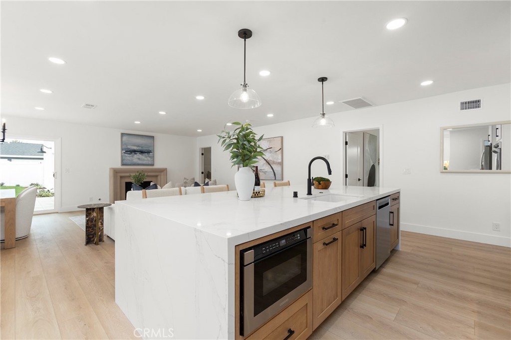 Massive Waterfall Island with Sink and Under-Counter Built-in Microwave - 394 Magnolia Street, Costa Mesa CA 92627 - photo 11