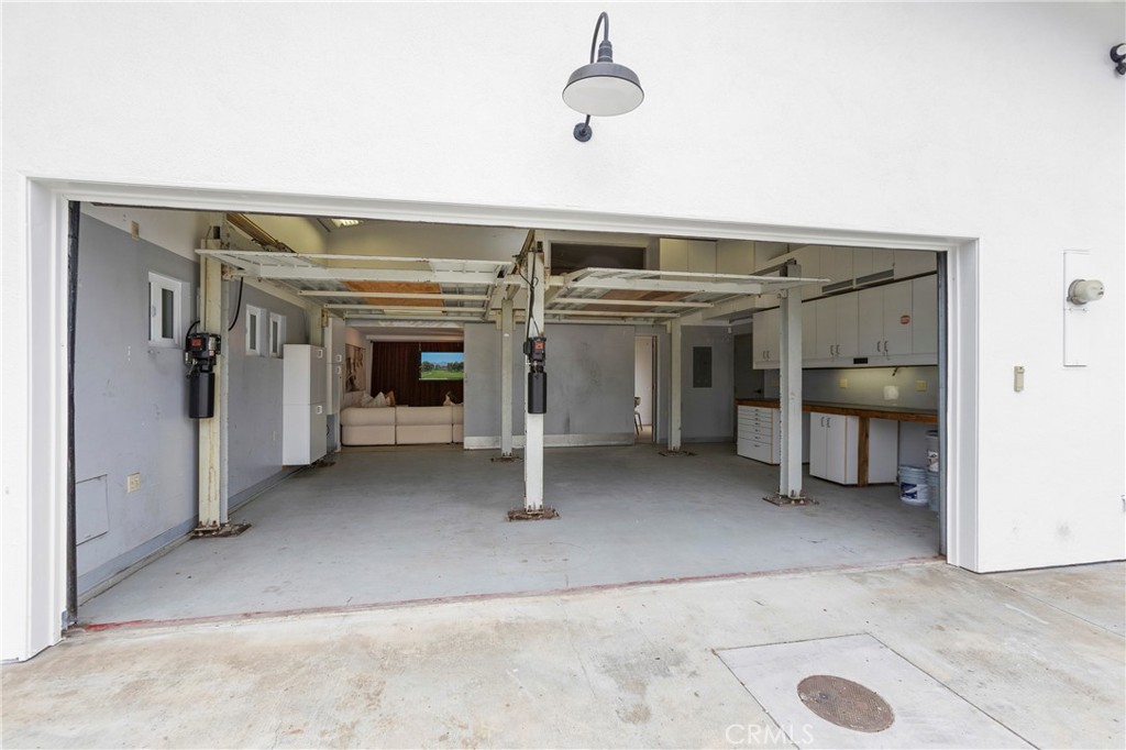 Original Photo Original Photo with Sliding Wall OPEN to Flex Space/Bonus Room - Storage Attic above Flex Room w/drop dow - 394 Magnolia Street, Costa Mesa CA 92627 - photo 62