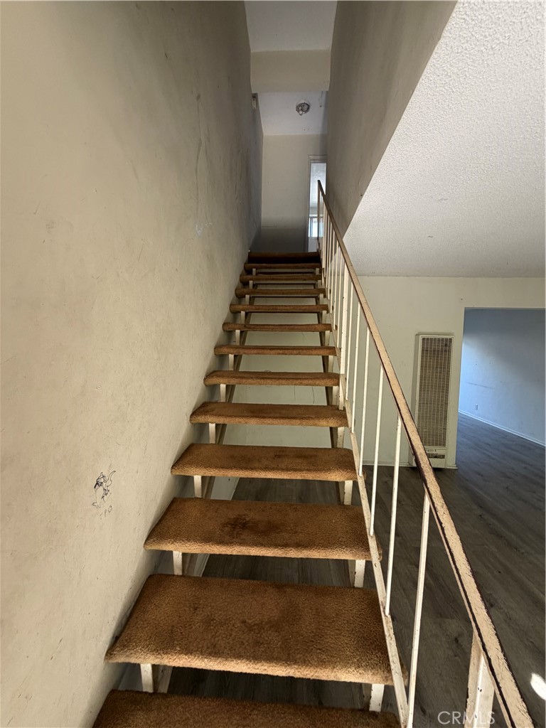 Stairs in vacant two story unit - 681 Victoria, Costa Mesa CA 92627 - photo 25