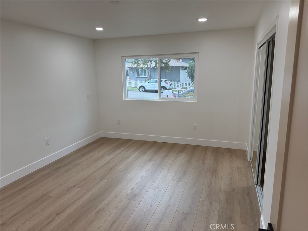 "Downstairs Bedroom with mirrored closet doors" - 685 Center St, Costa Mesa CA 92627 - photo 11