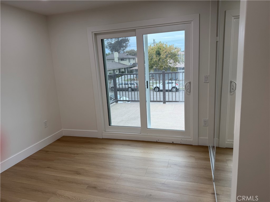 "Upstairs bedroom #2 with balcony" - 685 Center St, Costa Mesa CA 92627 - photo 14