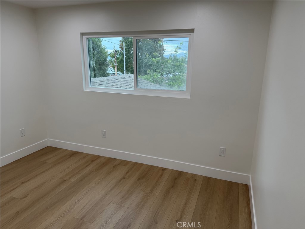 "Upstairs bedroom #3 with mirrored closet doors" - 685 Center St, Costa Mesa CA 92627 - photo 19