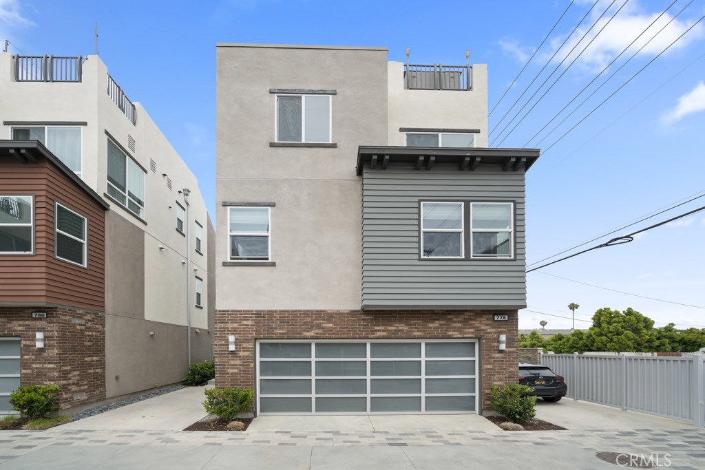Garage Entrance-End Unit - 778 Wonder Lane 8, Costa Mesa CA 92627 - photo 1