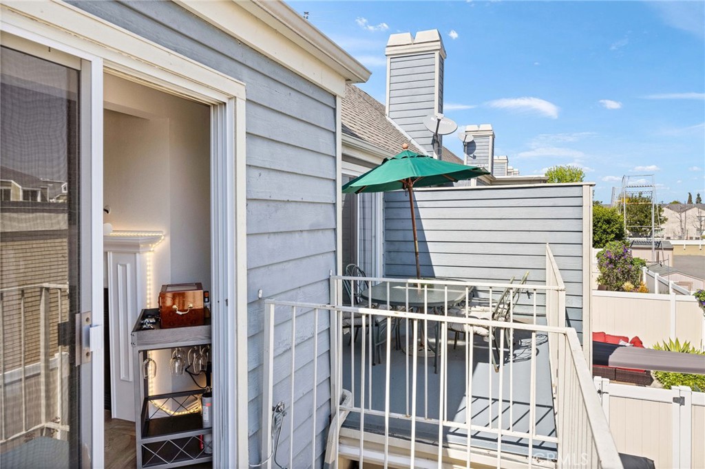 Two separate balconies off of the living room and the primary bedroom! - 810 Baker 210, Costa Mesa CA 92626 - photo 20