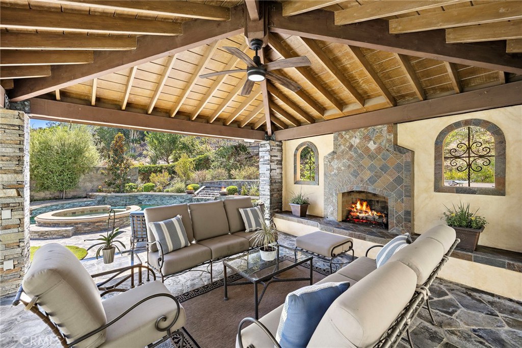 outdoor pergola with stone fireplace - 1 Sausalito, Coto de Caza CA 92679 - photo 24
