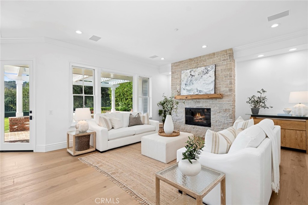 Family Room/ With limestone fireplace - 15 Canada Oaks, Coto de Caza CA 92679 - photo 13