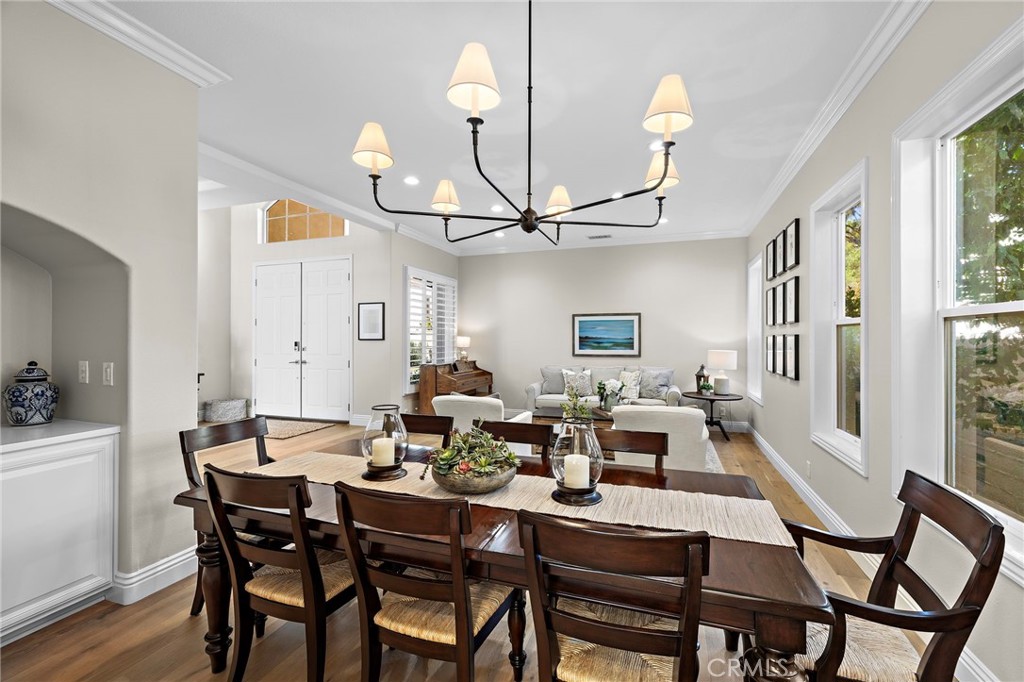 beautiful formal dining with a convenient side serving and storage area. lots and lots of light in this home where the o - 17 Raleigh Court, Coto de Caza CA 92679 - photo 6