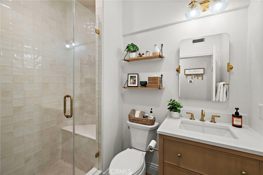 The downstairs bath is privately away from the 'party' and is upgraded so so beautifully! everything is NEW and perfect! - 17 Raleigh Court, Coto de Caza CA 92679 - photo 16