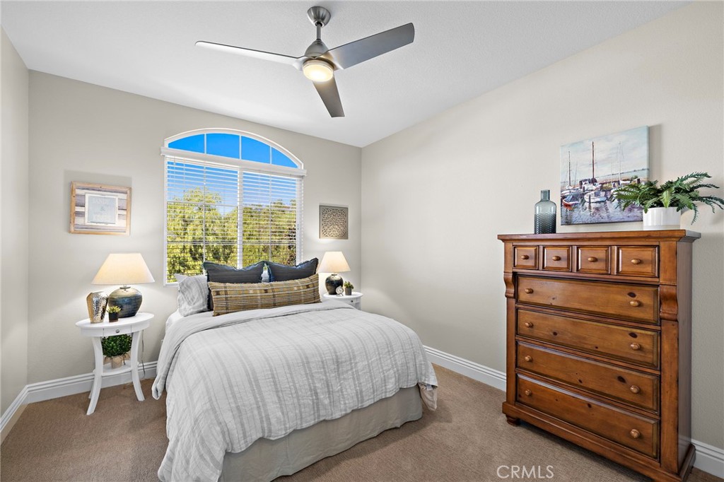 One of the secondary bedrooms on the opposite side of the home with a deck and wouldn't that be nice!?! - 17 Raleigh Court, Coto de Caza CA 92679 - photo 29