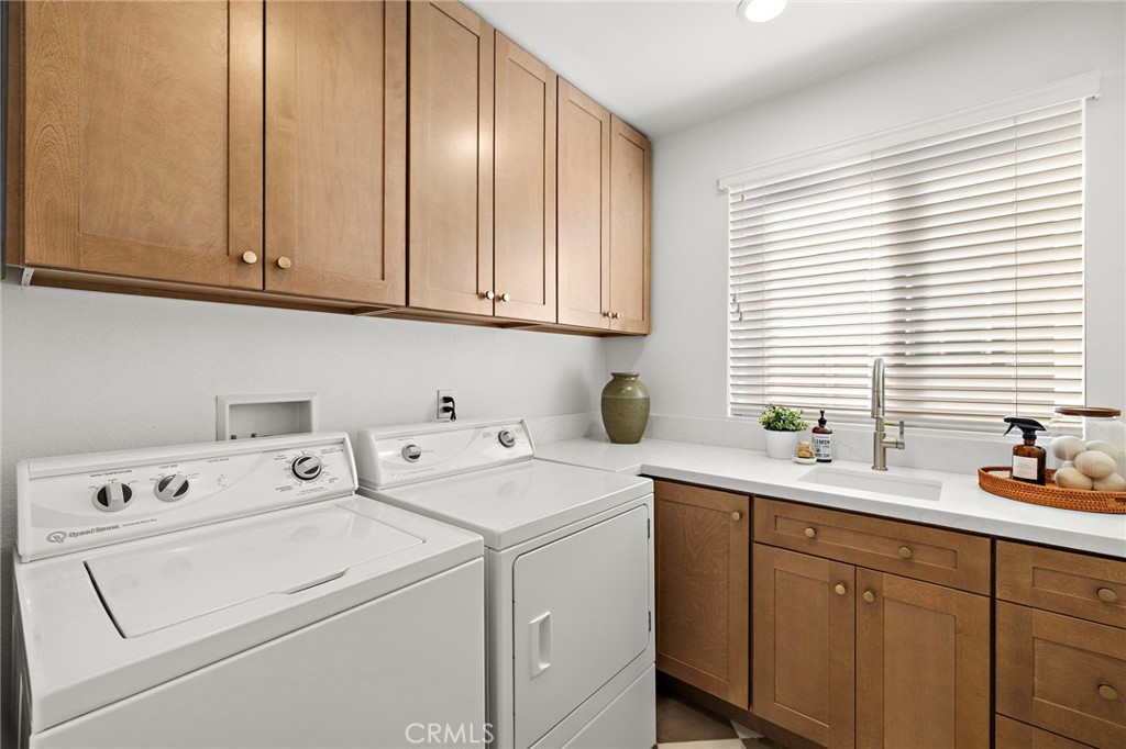 A dreamy laundry room. So bright and cheery! So beautiful with fabulous flooring and counters! This will make laundry... - 17 Raleigh Court, Coto de Caza CA 92679 - photo 25