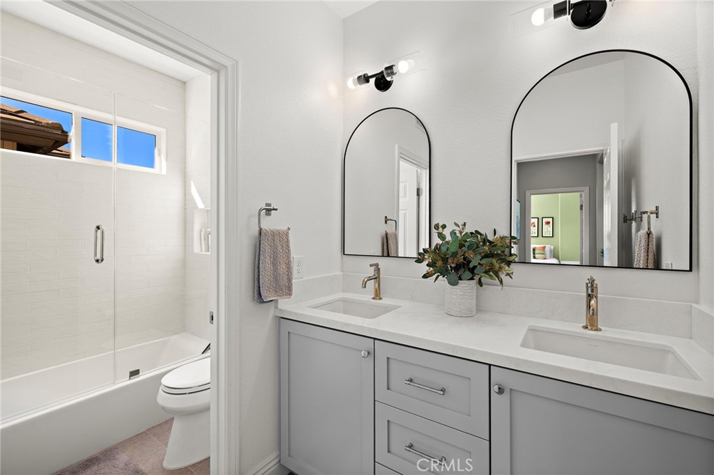 A gorgeous hall bath that is done to perfection! Dual sinks of course and a privacy door for the tub/shower and toilet - - 17 Raleigh Court, Coto de Caza CA 92679 - photo 31