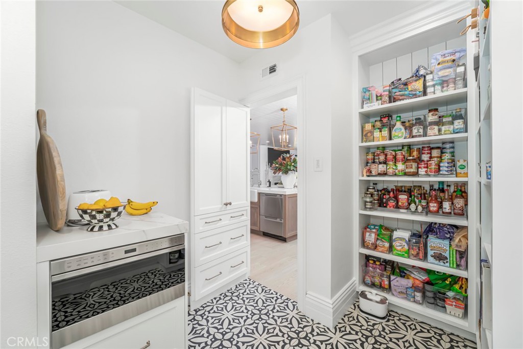 Walk-in Pantry with coffee bar, beverage Frig and microwave drawer - 2 Water Lily, Coto de Caza CA 92679 - photo 21