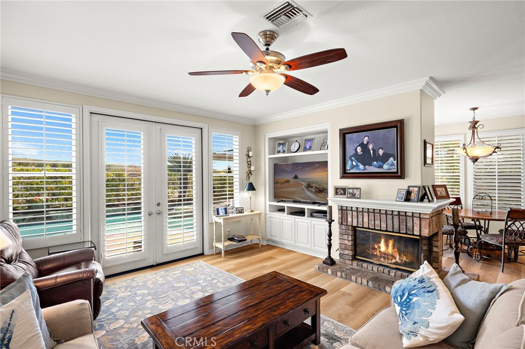 Family room with fireplace and French doors - 20 Edgewood, Coto de Caza CA 92679 - photo 20