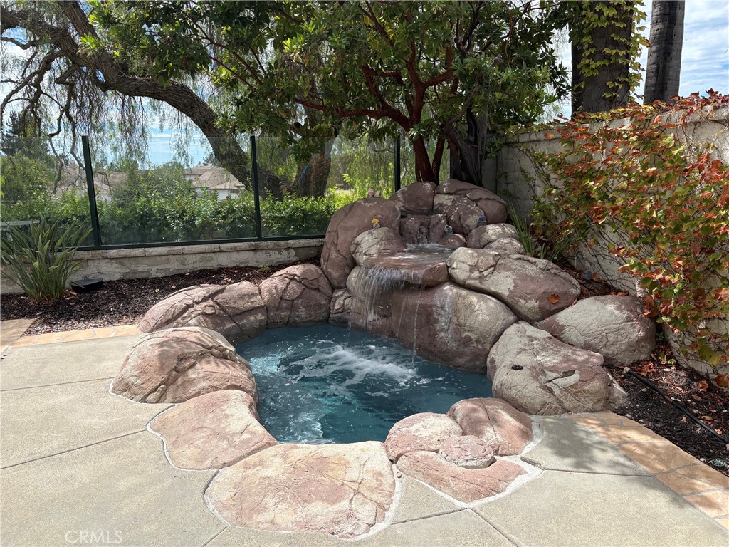 Water feature spills into your Private Saltwater Spa - 5 Mountain Gate, Coto de Caza CA 92679 - photo 14