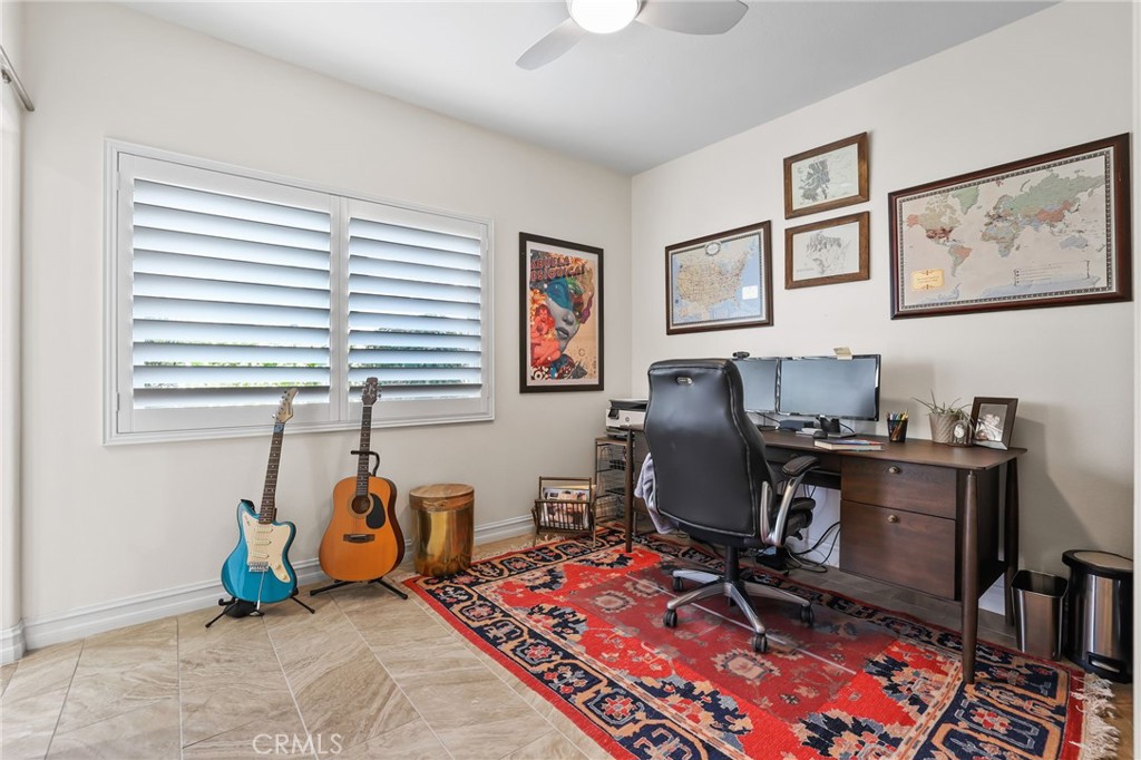 A versatile main floor bedroom makes a perfect home office, guest suite or music room - 5 Mountain Gate, Coto de Caza CA 92679 - photo 26