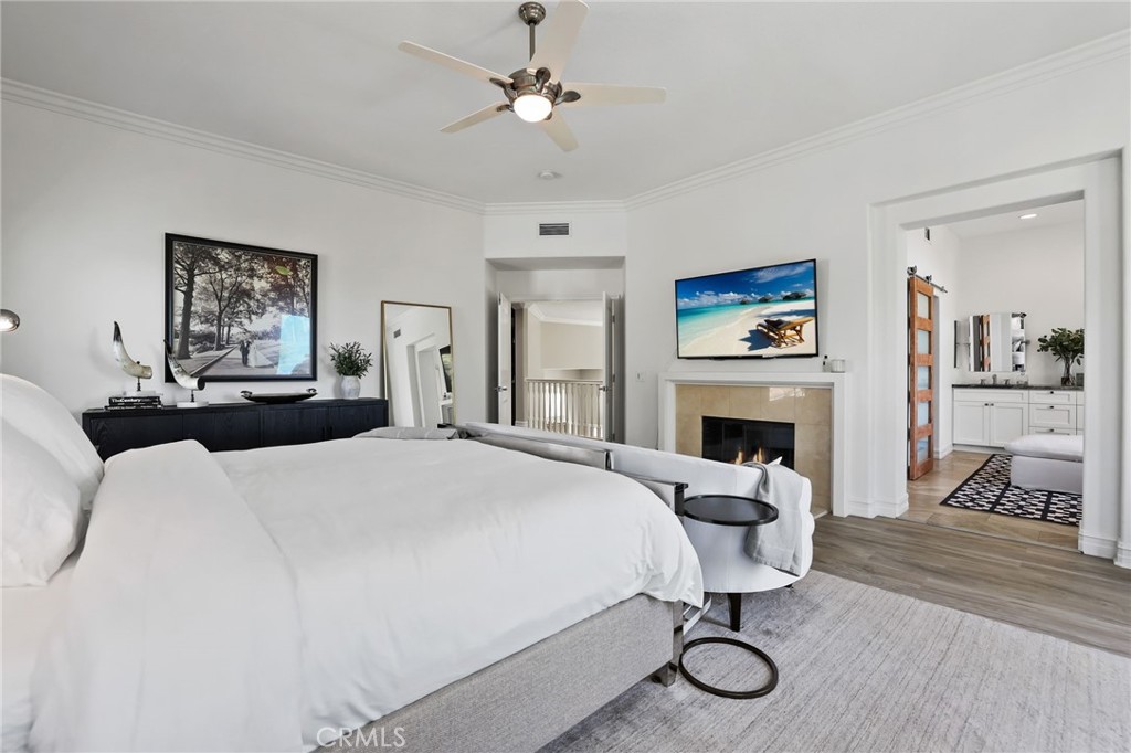 Enjoy the fireplace in the spacious primary suite - 5 Mountain Gate, Coto de Caza CA 92679 - photo 34
