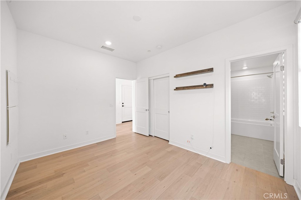 First Floor Bedroom - 10301 Triple Crown Lane, Cypress CA 90720 - photo 17