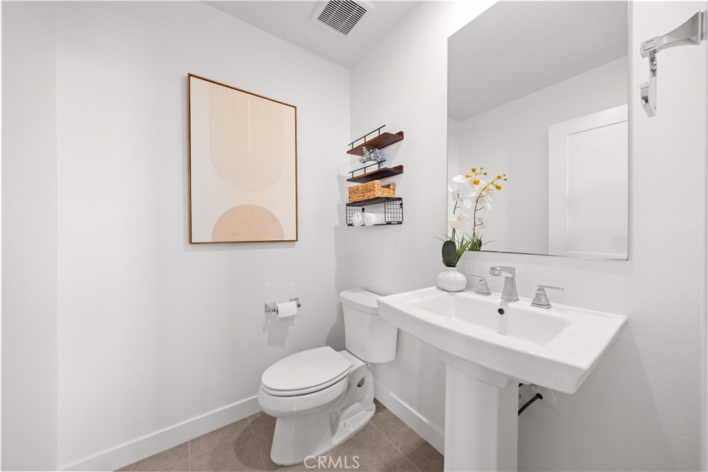 2nd Floor Powder Room - 10301 Triple Crown Lane, Cypress CA 90720 - photo 30