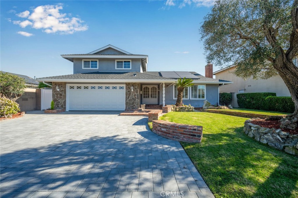 This Fairway Park home in Cypress really delivers with stunning curb appeal - 10446 Julie Beth Circle, Cypress CA 90630 - photo 1