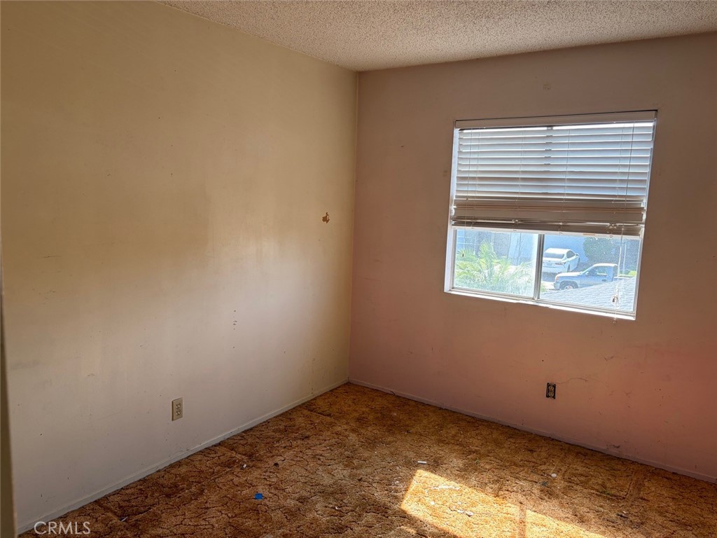 bedroom upstairs lots of light - 6859 Tahiti, Cypress CA 90630 - photo 22