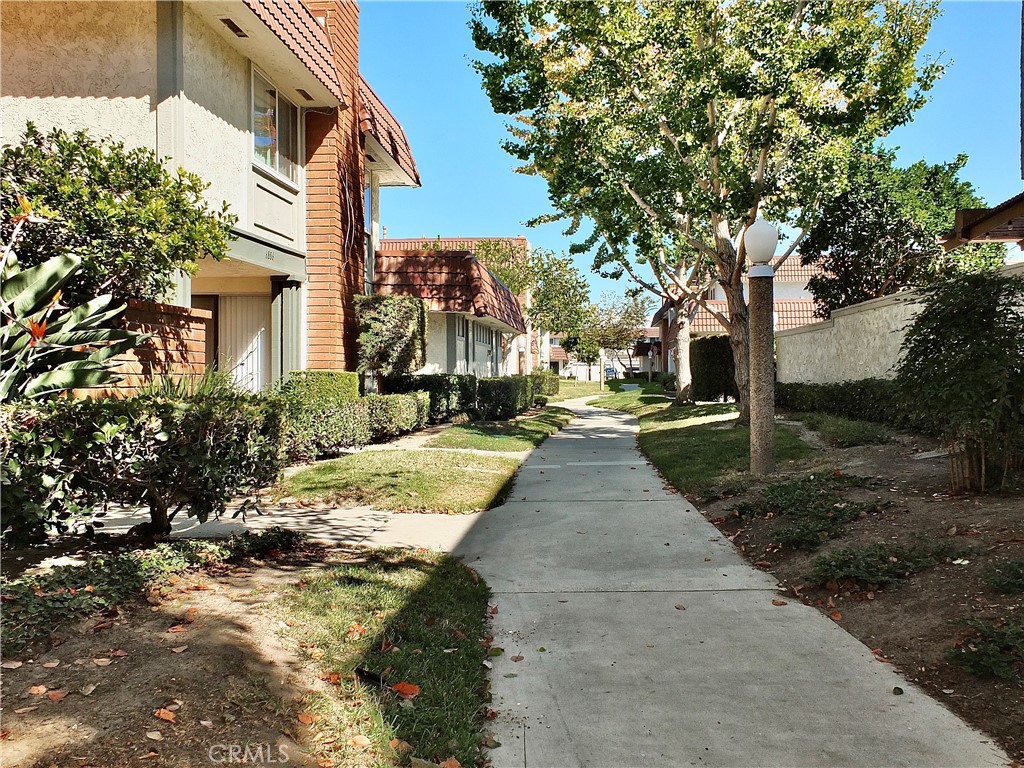 Greenbelt leading to 6884 Breton Way - 6884 Breton, Cypress CA 90630 - photo 2