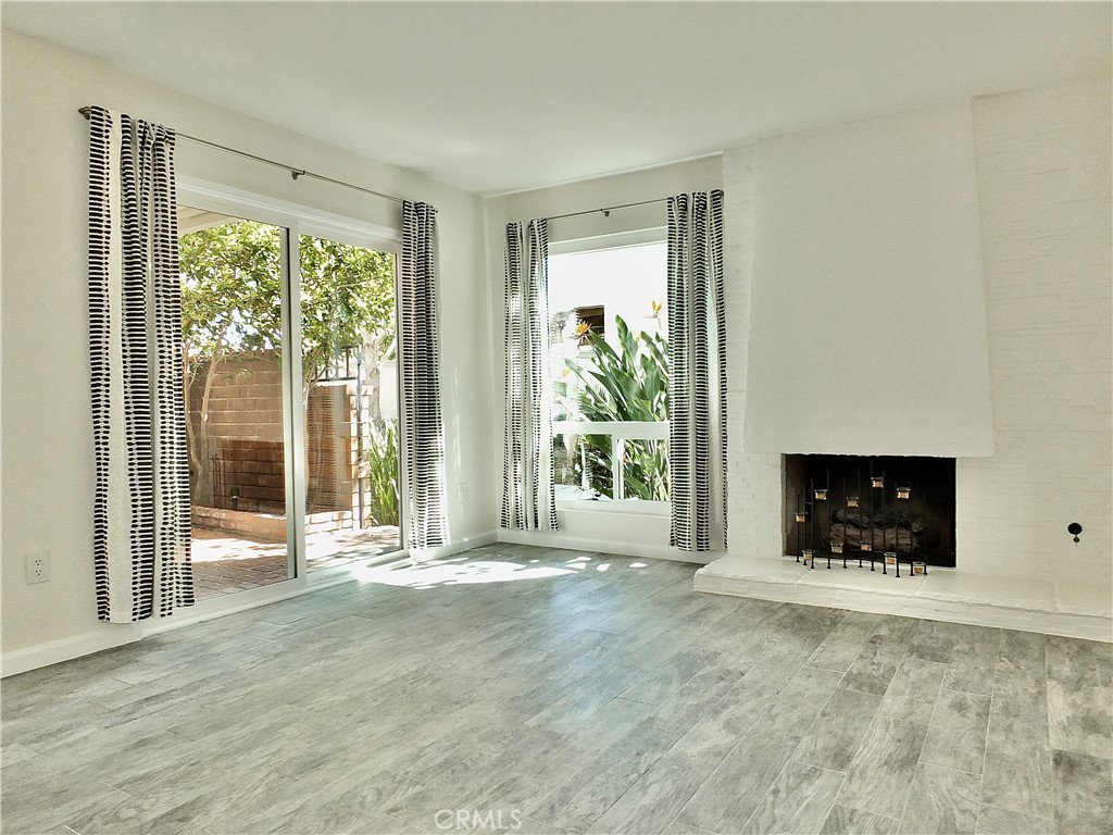Living Room with Gas Log Fireplace - 6884 Breton, Cypress CA 90630 - photo 5