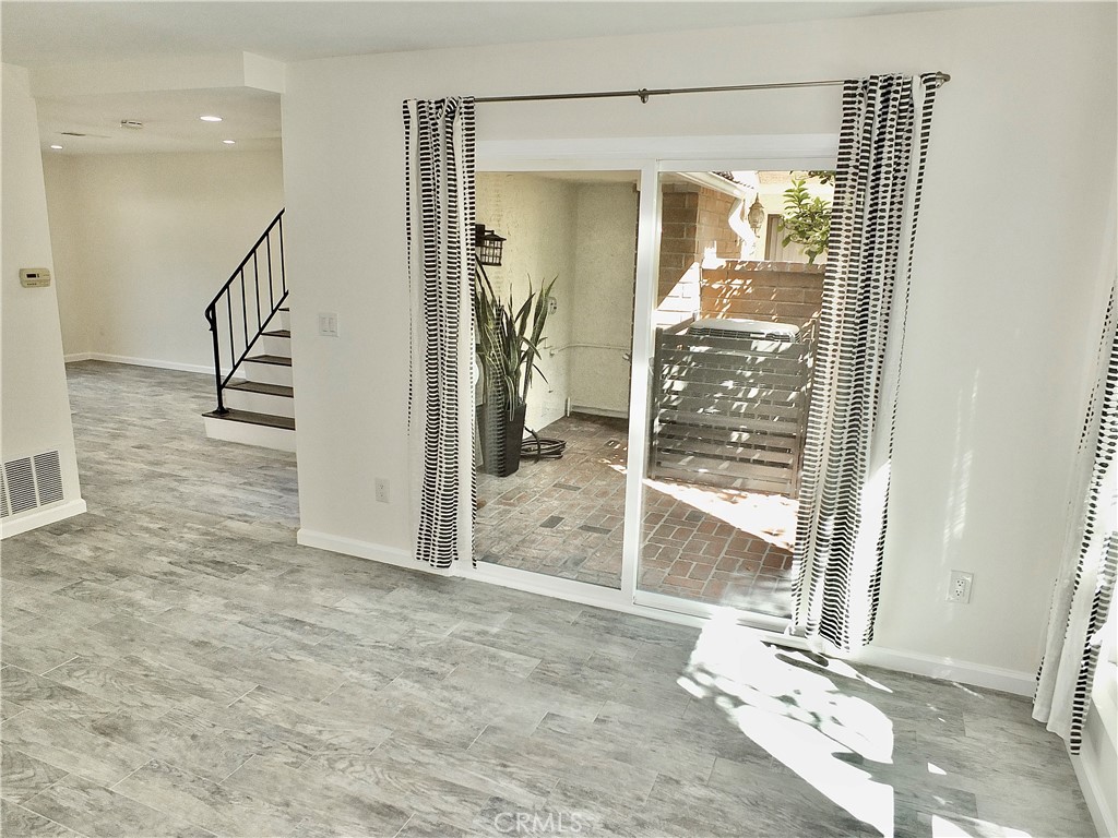 Living Room View to front patio and to Dining/Family area - 6884 Breton, Cypress CA 90630 - photo 6