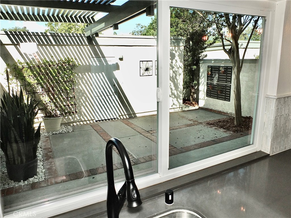 Kitchen view to Patio - 6884 Breton, Cypress CA 90630 - photo 13