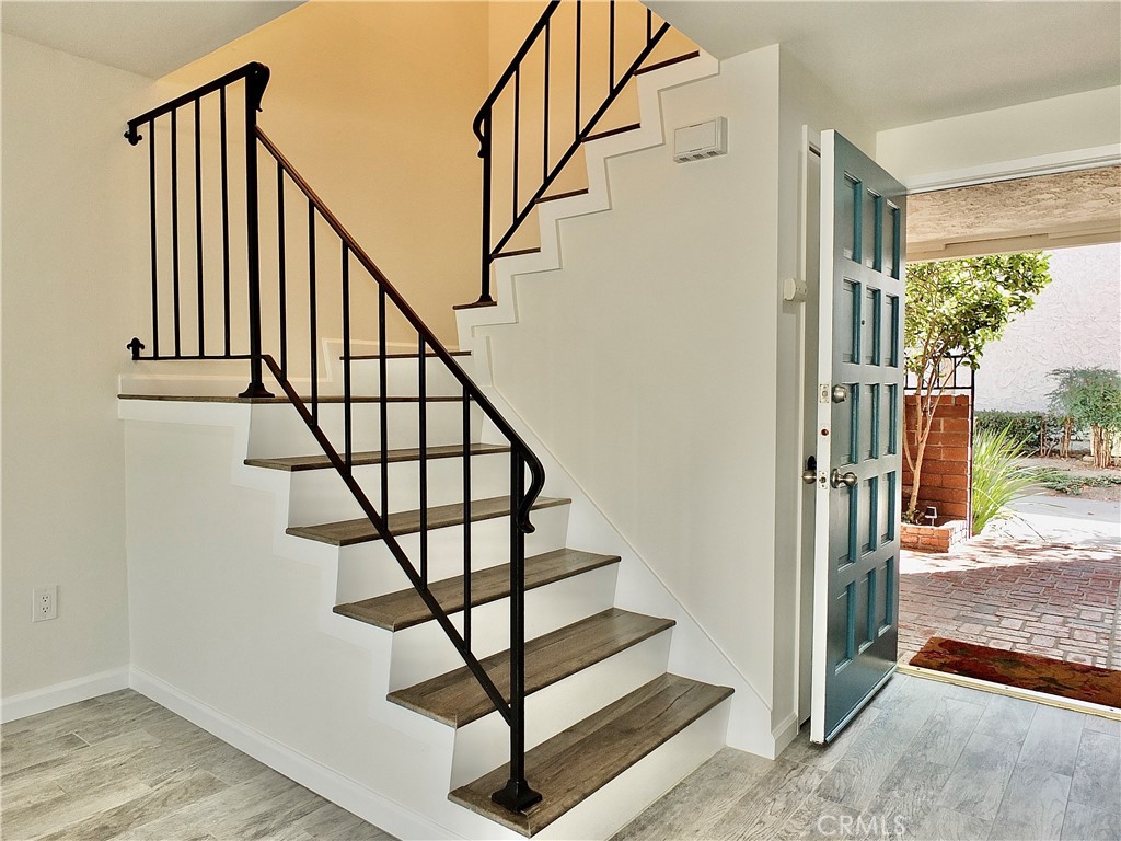 Stairs to upper lever - 6884 Breton, Cypress CA 90630 - photo 18
