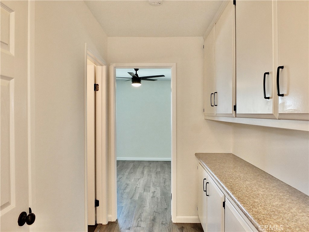 Hall to primary bedroom - 6884 Breton, Cypress CA 90630 - photo 19
