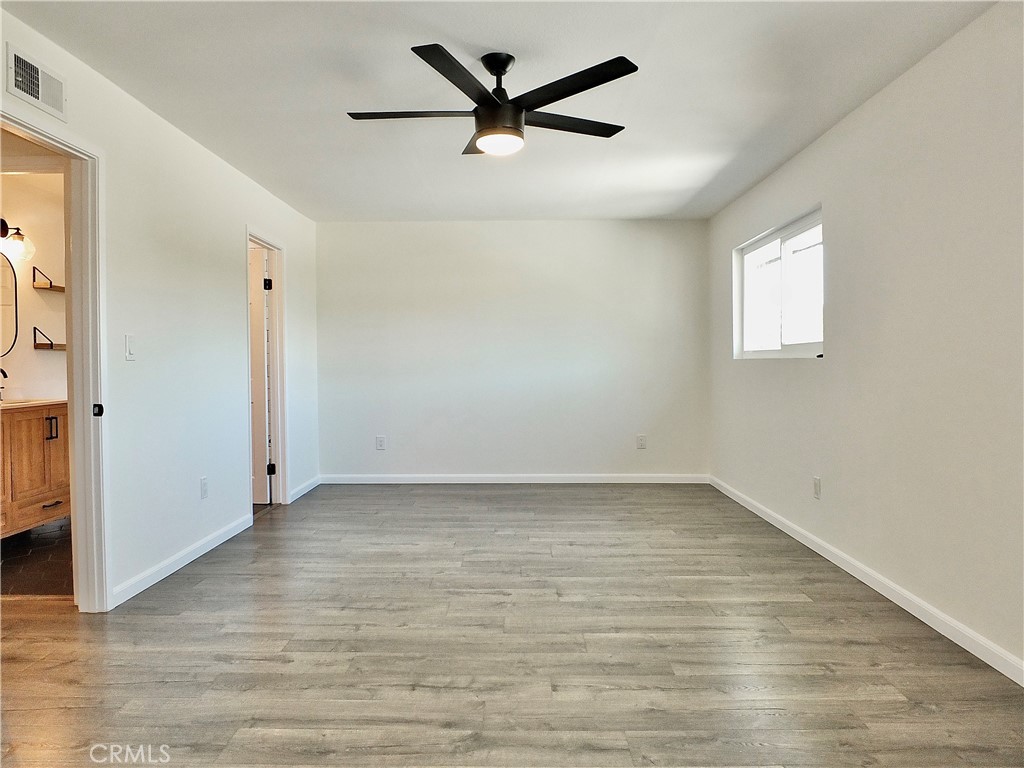 HUGE primary bedroom - large enough for bedroom and an office, or a nursery!!! - 6884 Breton, Cypress CA 90630 - photo 20