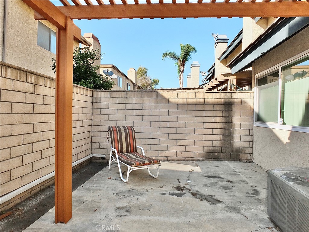 Another view of the patio. - 8485 Kington Way 11, Cypress CA 90630 - photo 13