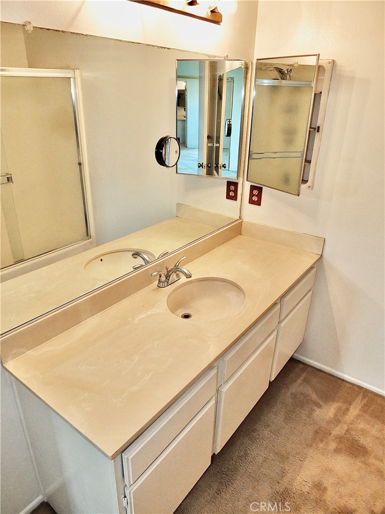 The primary bathroom. - 8485 Kington Way 11, Cypress CA 90630 - photo 24