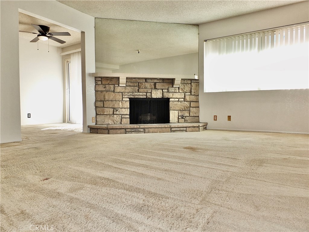Spacious living room. - 8485 Kington Way 11, Cypress CA 90630 - photo 32