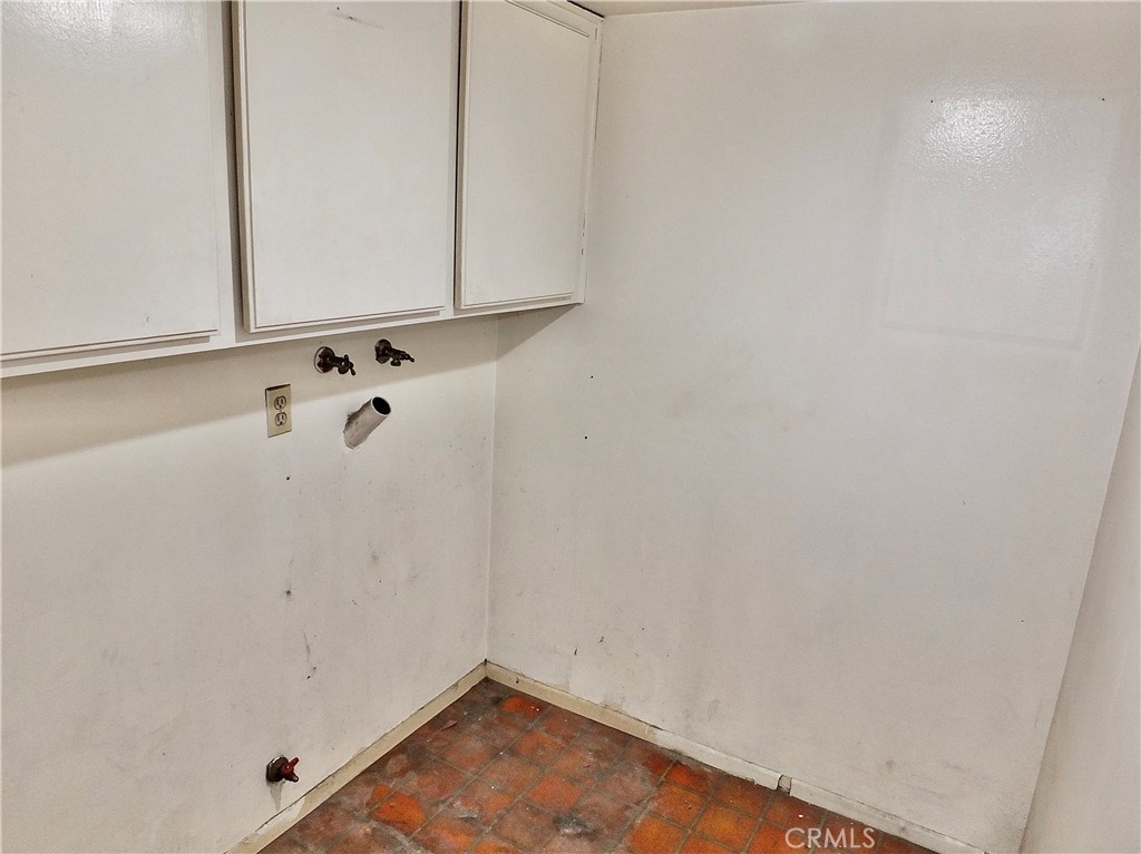 Laundry hook up is in the garage. - 8485 Kington Way 11, Cypress CA 90630 - photo 33