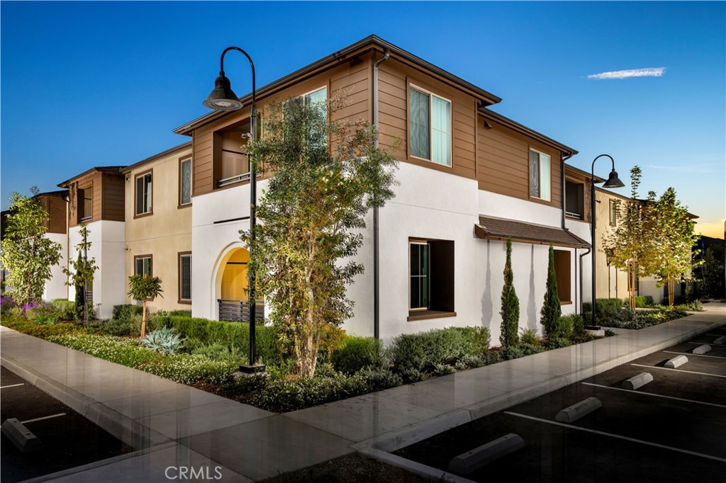 Photos shown are of model only-not actual homesite. - 9011 Cerise Lane 129, Cypress CA 90630 - photo 1