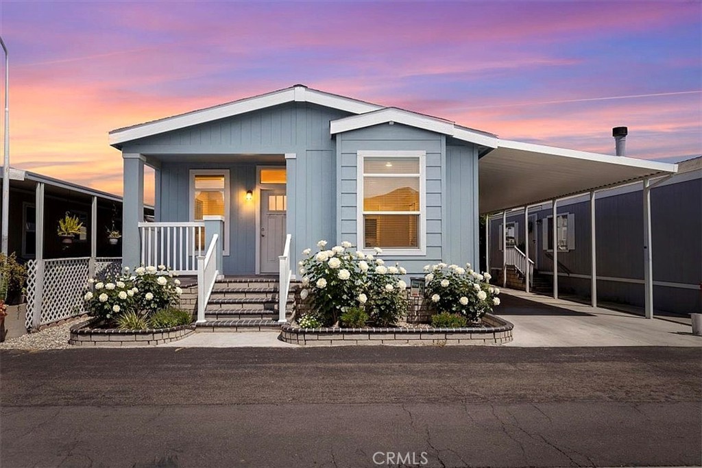 Front of home: 9080 Bloomfield spc 231, Cypress: Digitally Enhanced Front Exterior: Image has been digitally enhanced to - 9080 Bloomfield 231, Cypress CA 90630 - photo 4